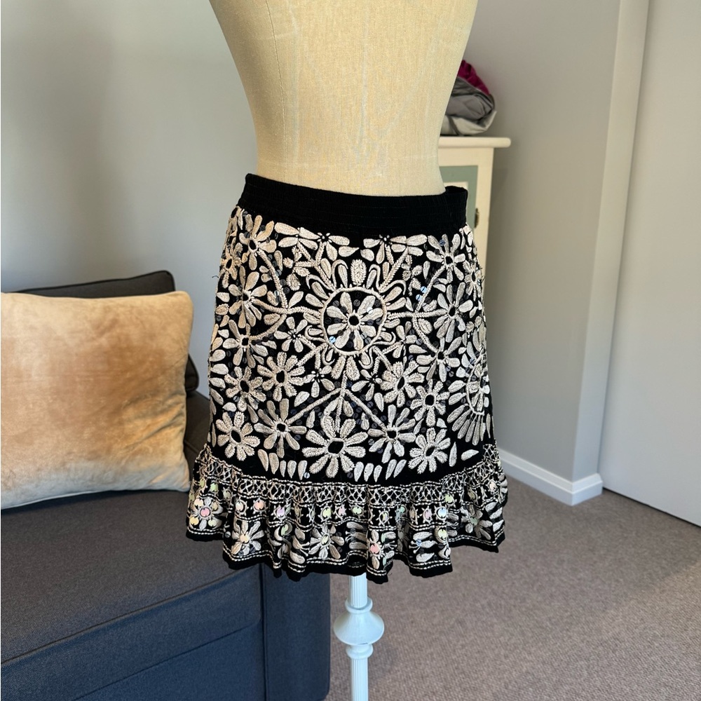 Free People embroidered mini skirt with sequins.